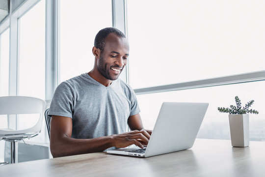 man using laptop